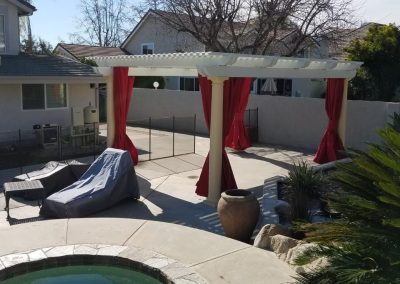 ALUMAWOOD PATIO COVER WITH EXTERIOR DRAPES BY THE AWNING COMPANY ORANGE COUNTY